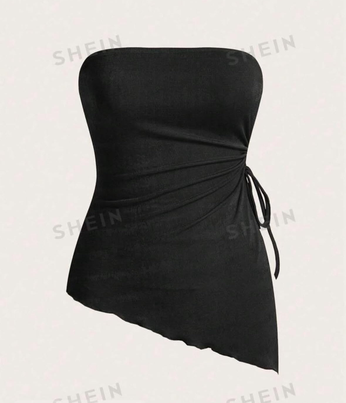 Haut noir asymétrique avec nœud sur le côté