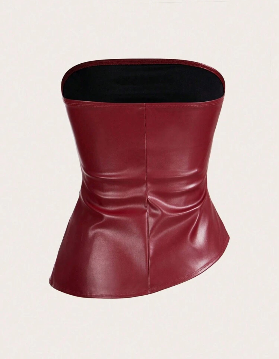 Top en cuir avec drapé asymétrique