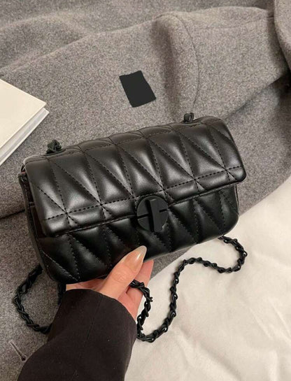 Sac à bandoulière style matelassé motif chevron