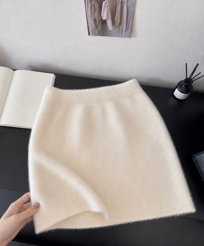 Jupe midi moulante en tricot à taille élastique de couleur unie