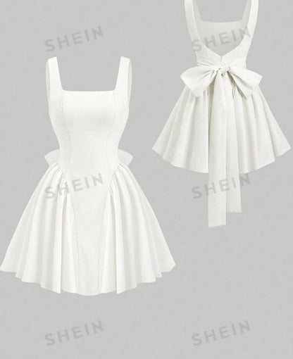 Robe d'été à col carré et dos nu avec grand nœud papillon