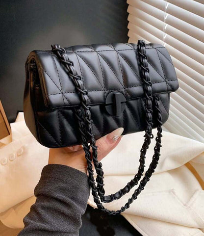 Sac à bandoulière style matelassé motif chevron